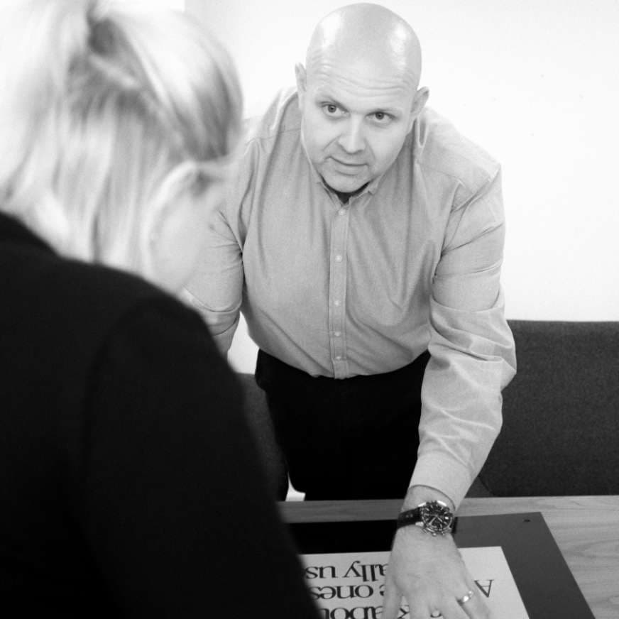 Marketing Consultancy – Ian reviewing a design