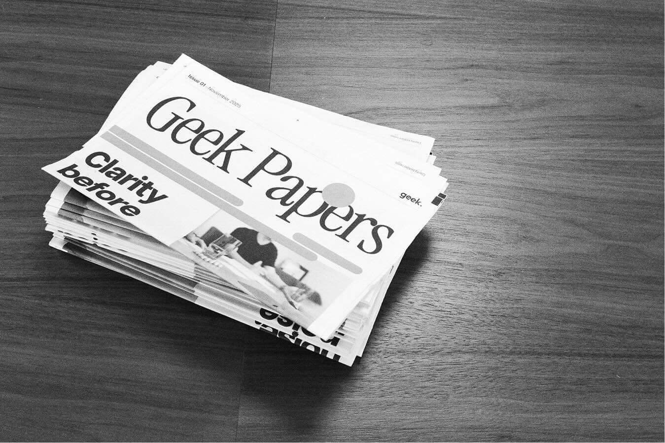 A stack of newspapers entitled Geek Papers.